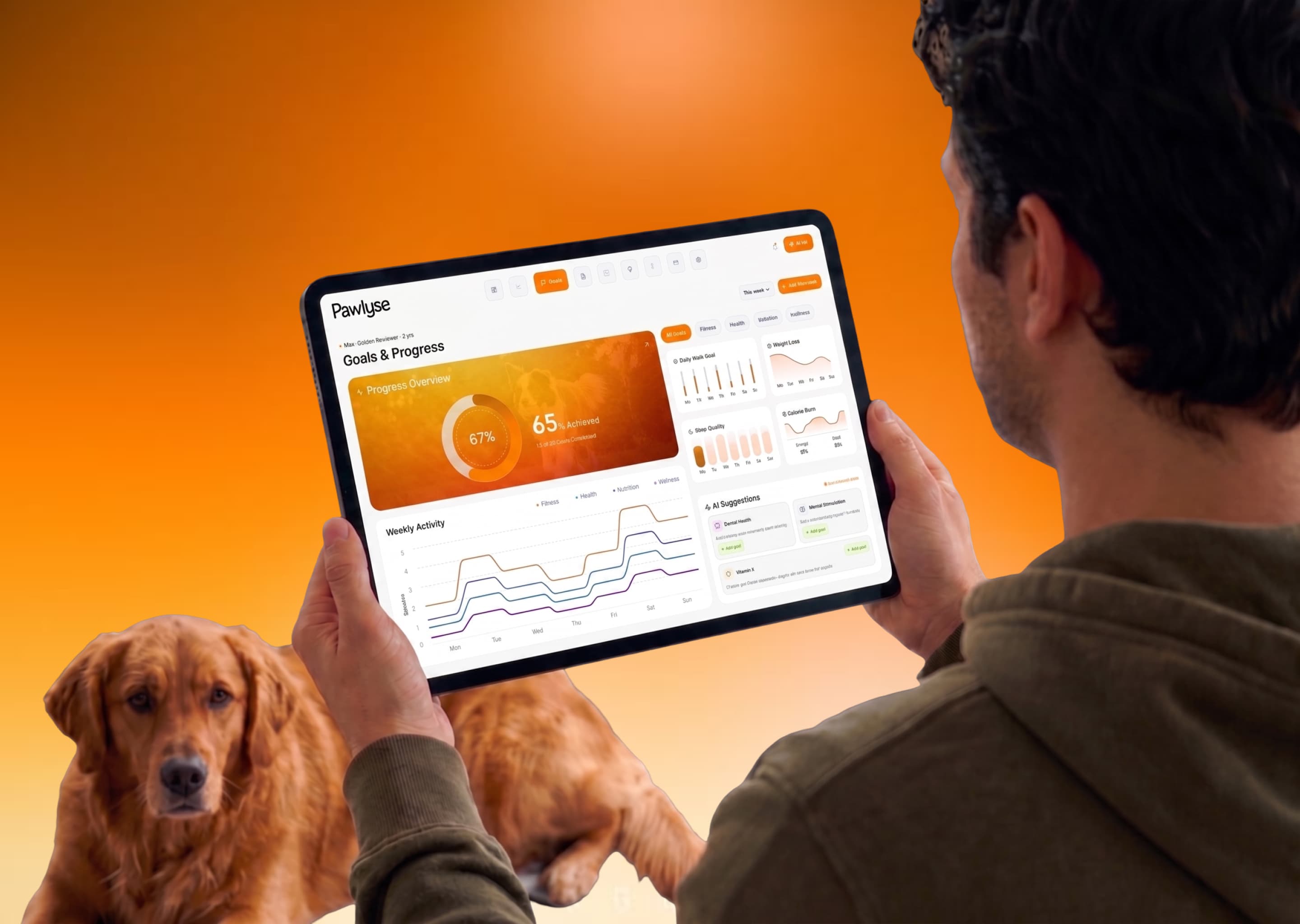 A man with two golden retrievers, both dogs’ goals and progress on one tablet screen